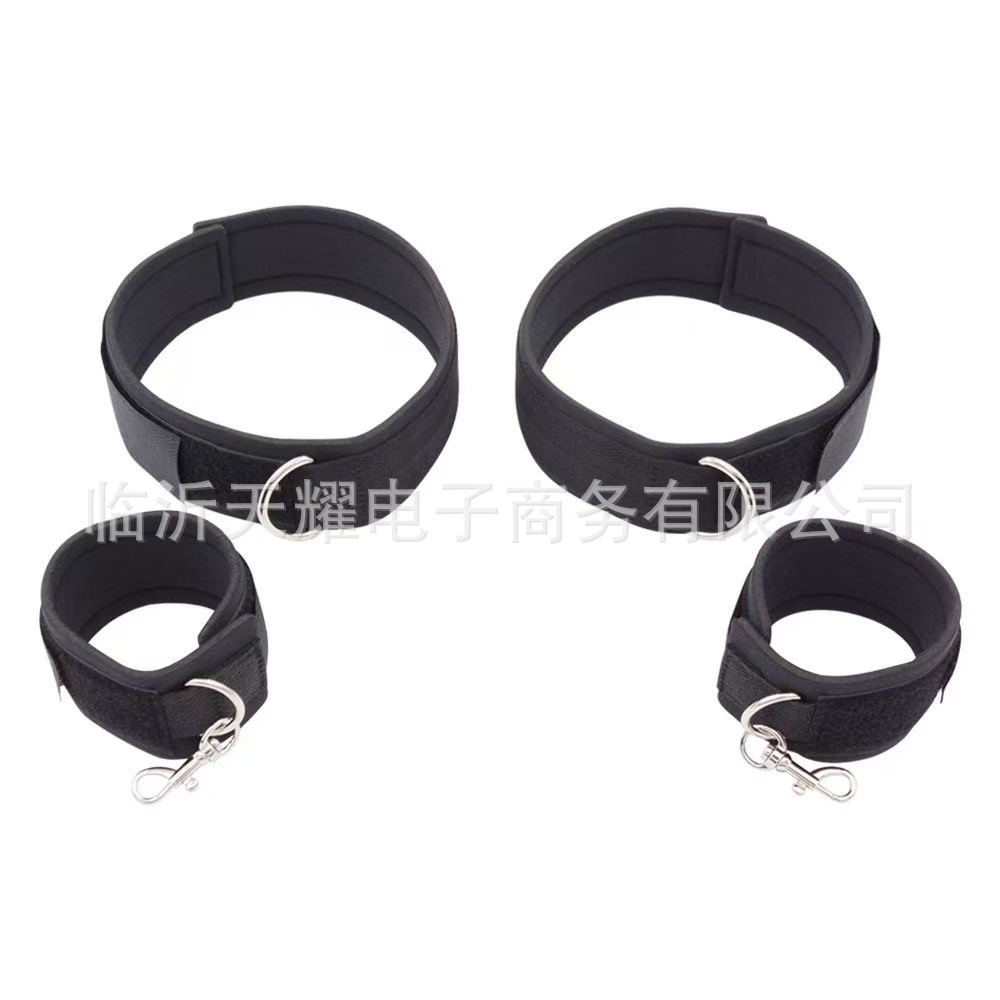 Black Velcro nylon handcuffs and leg irons for adults, used as emotional toys, SM props, and foot restraint.