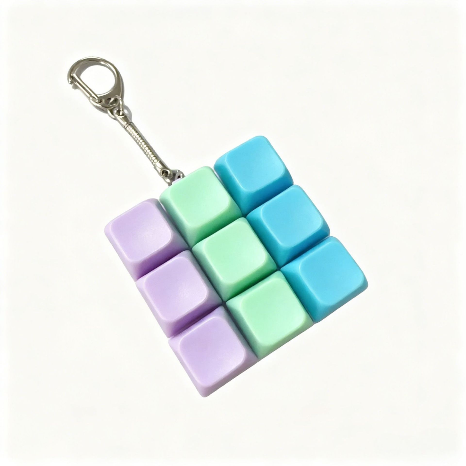 9-key cross-border stress-relieving keel chain solid color mixed color fingertip press keychain pendant