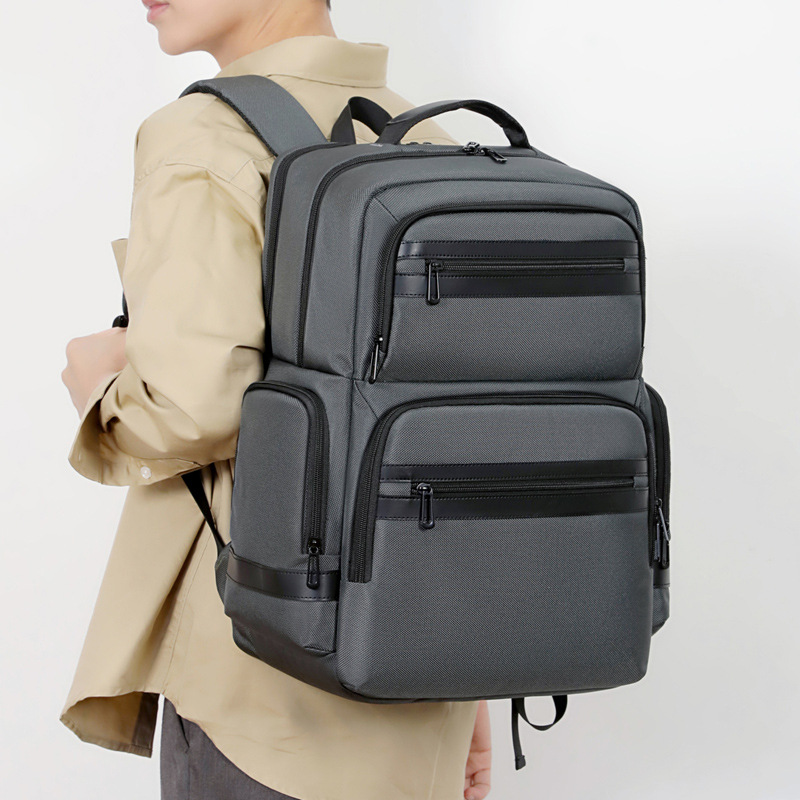 New large-capacity backpack for travel, leisure, business, and laptop use; simple, stylish, and casual schoolbag.