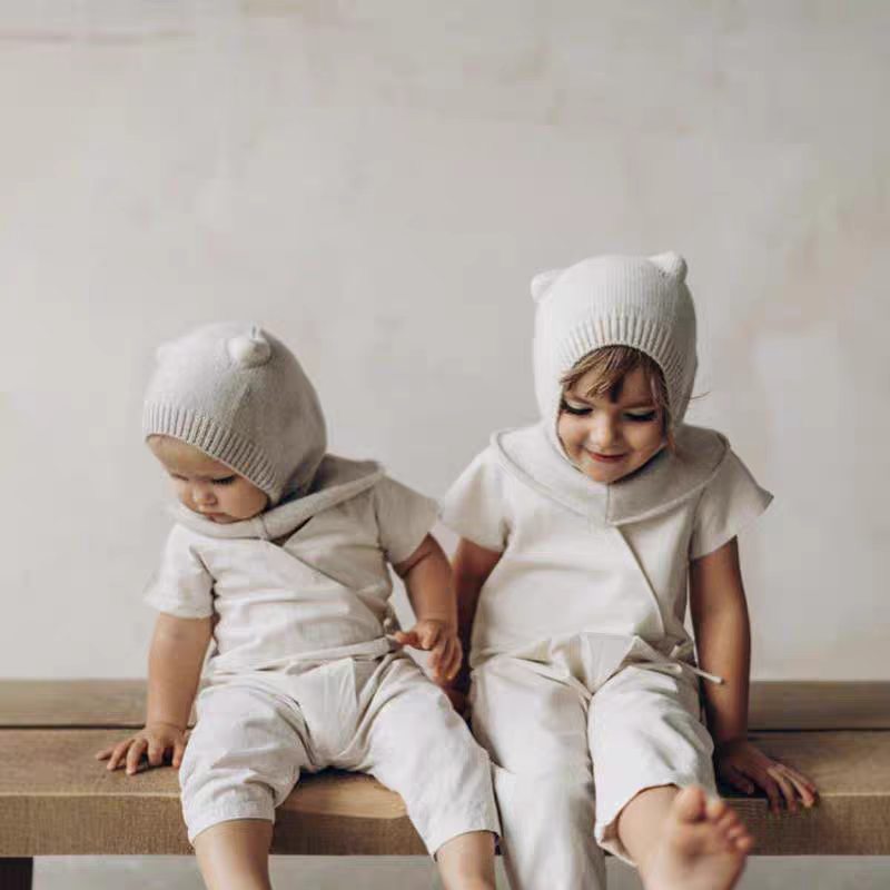 Cute knitted hat with integrated drawstring, baby ear scarf, warm baby and children's wool hat