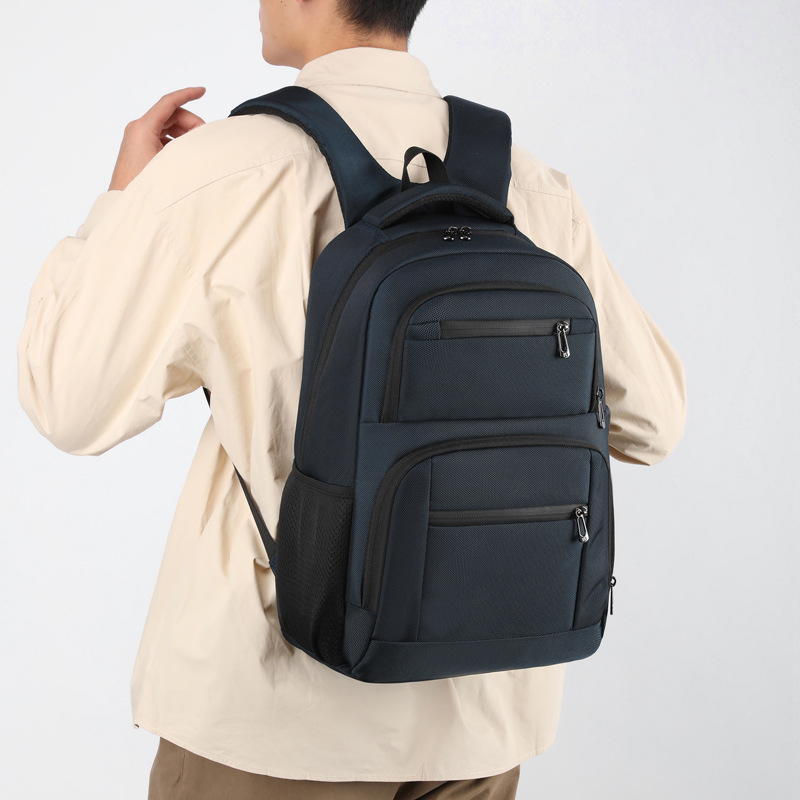 New large-capacity backpack for laptops, travel, business, and student use.