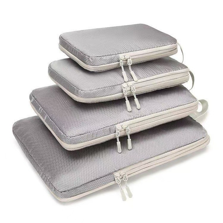 Travel storage bag compression bag four-piece set, a must-have for travel, for storing clothes, toiletries, and luggage.