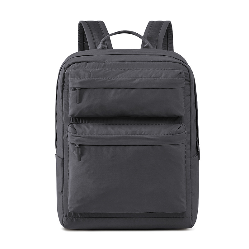 Large capacity pleated solid color backpack/computer bag, simple and versatile for junior and senior high school students, both boys and girls.