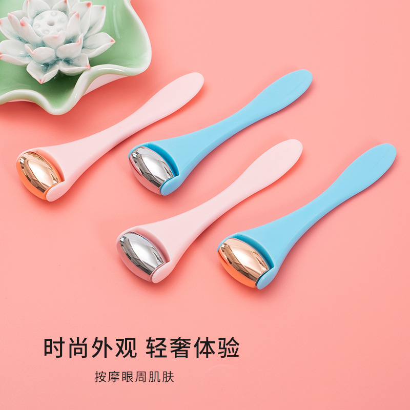 Cross-border best-selling facial plastic massage stick with zinc alloy roller, eye cream stick, pink multi-color beauty massager set