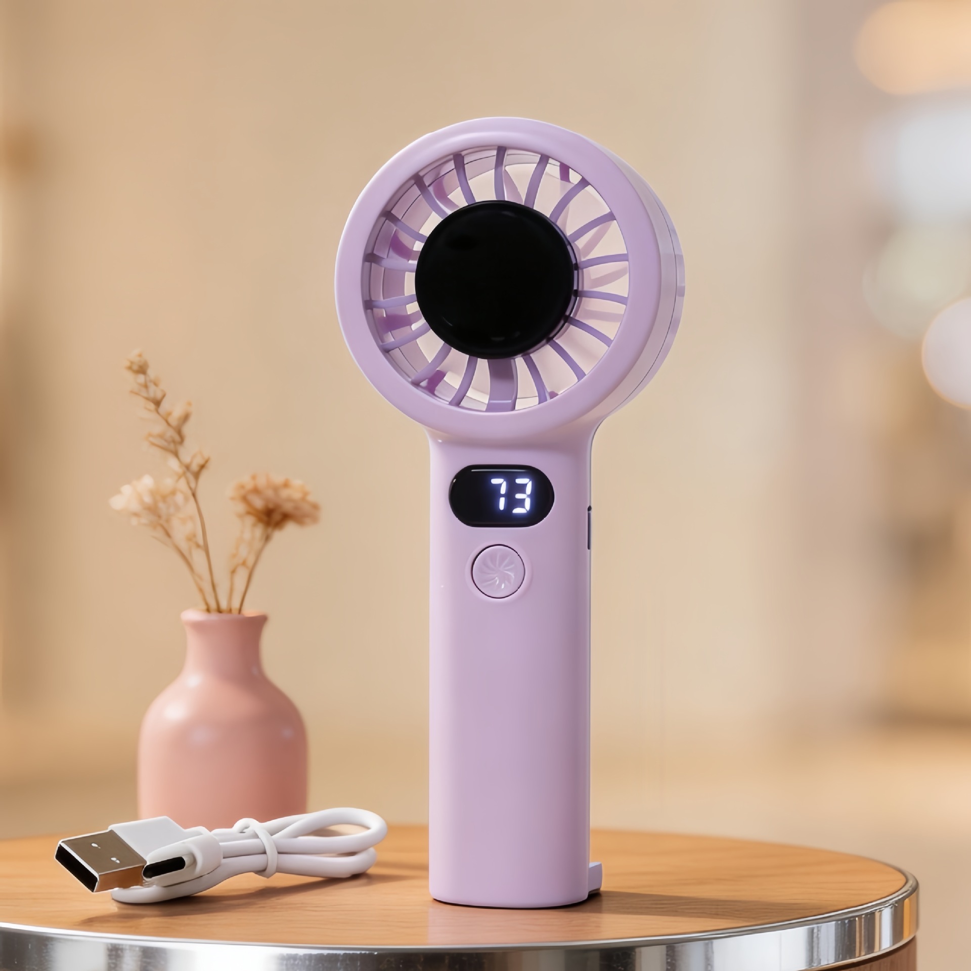 Handheld portable mini fan with ring handle, cartoon design, three wind speeds, USB rechargeable, portable desktop fan.