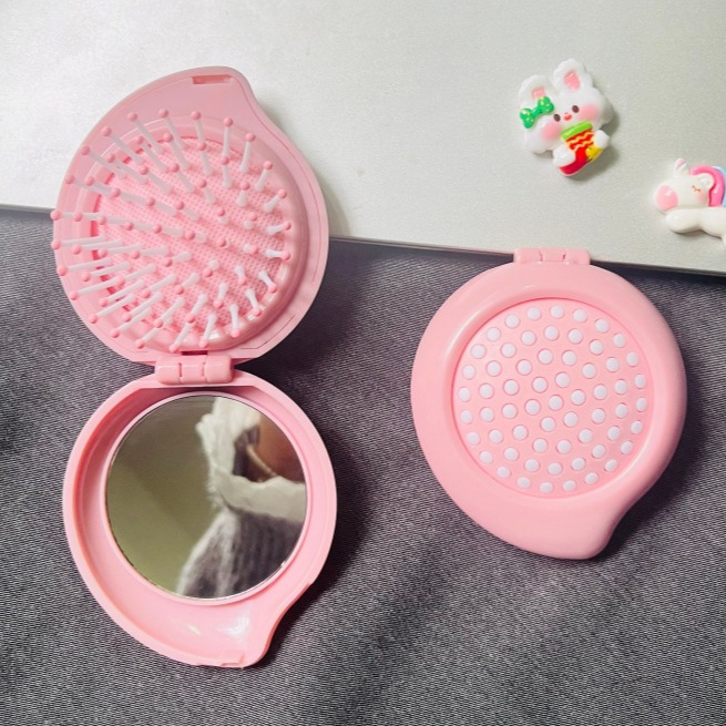 The Macaron airbag comb comes with a mirror massage comb for girls, candy-colored hair care, folding air cushion, and air cushion massage