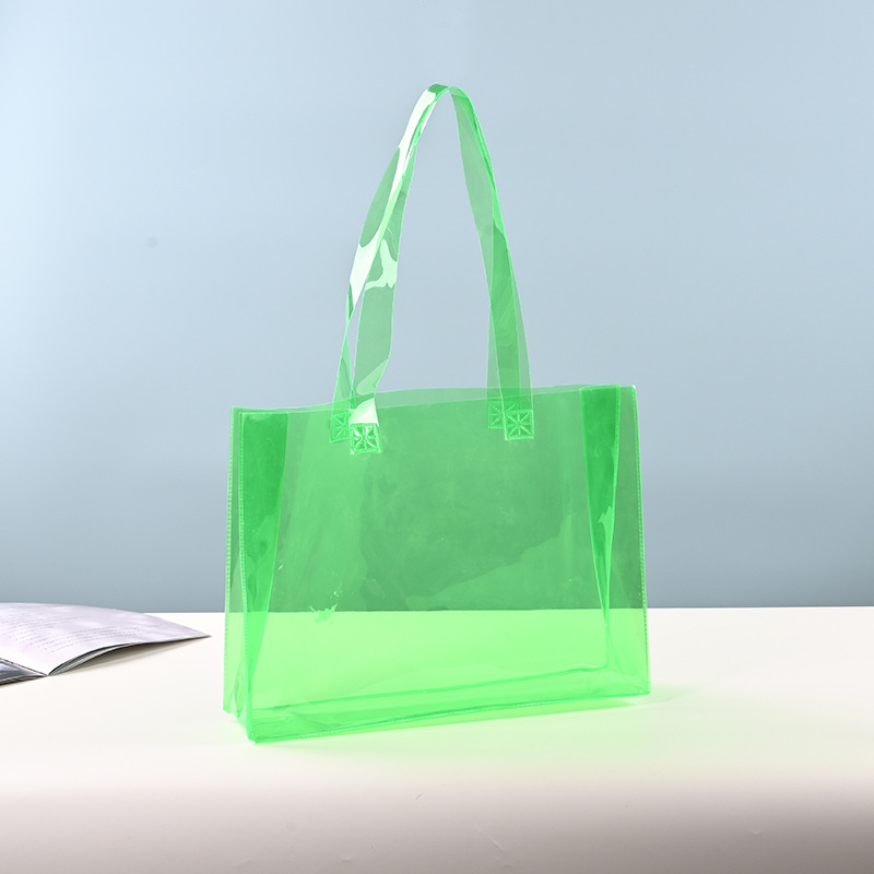 Ready-made PVC transparent plastic handbags, jelly-colored gift bags, clothing store shopping bags, logo printing and advertising customization