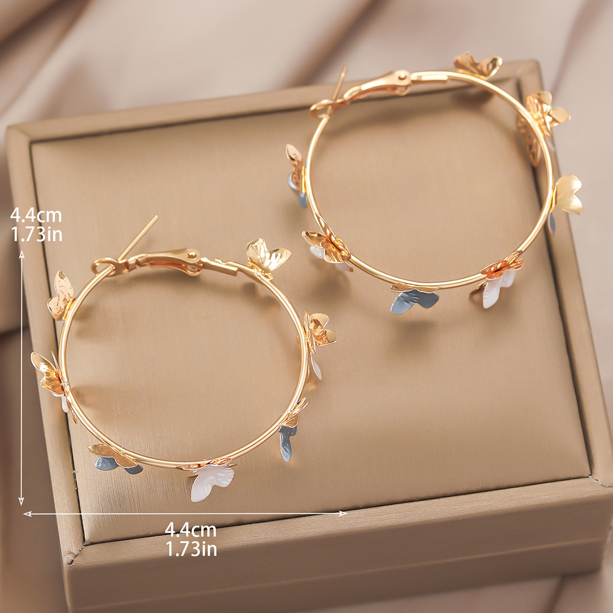 European and American cross-border Korean fashion tassel earrings, fresh, sweet, light luxury, exquisite cartoon butterfly hollow drip earrings