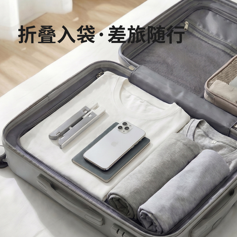 Folding clothes rack, multi-purpose folding clothes rack for business trips, hotels, and travel; portable for drying underwear, socks, and clothes.