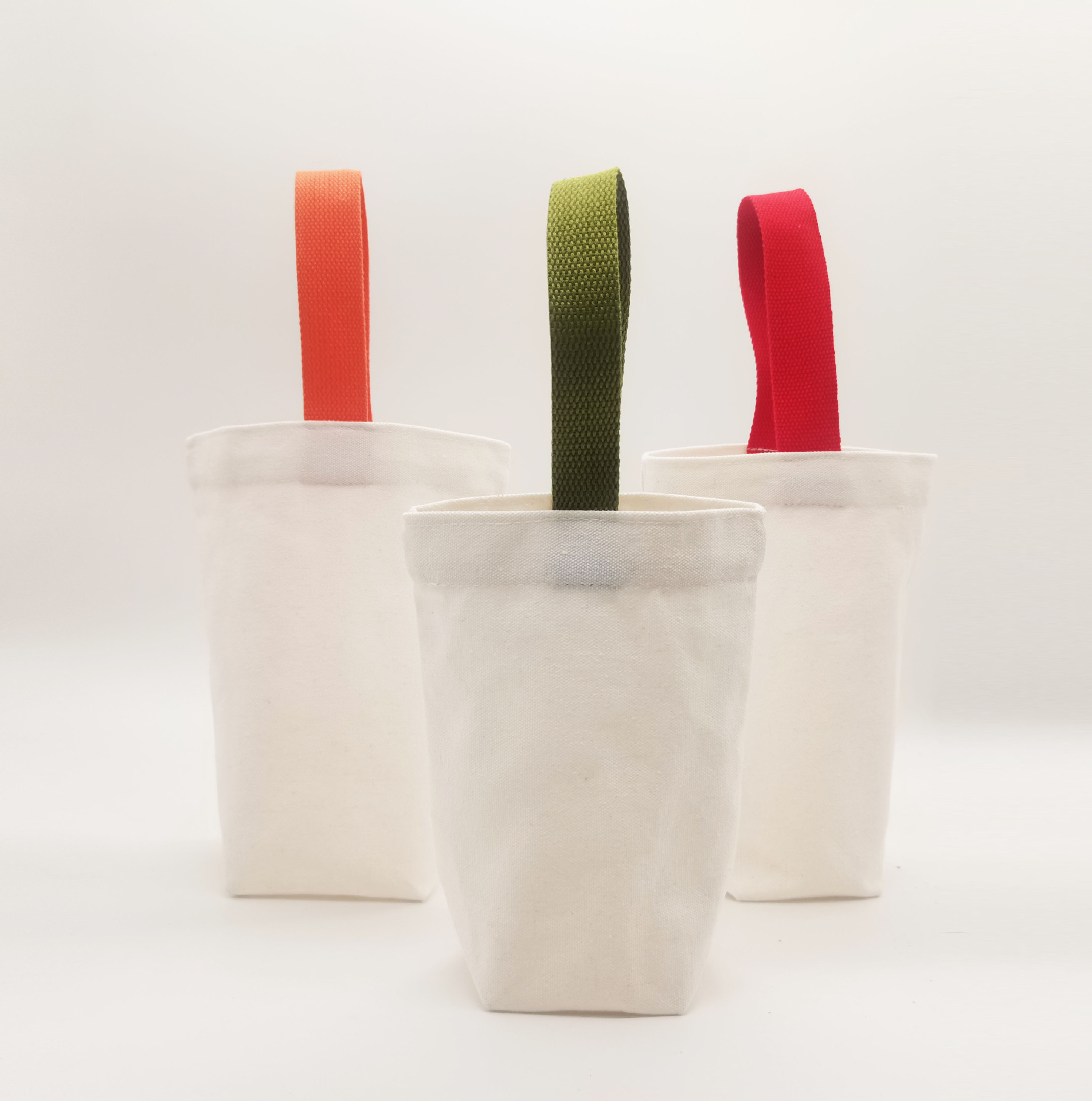 Factory direct supply of hand-shaken milk tea canvas bags, coffee cup sleeves, small cloth bags, and exquisite beverage carrying cup sleeves.