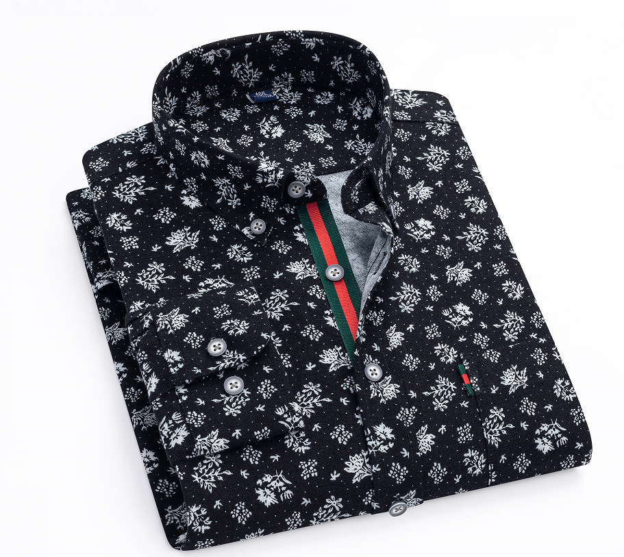 The new Spring and Autumn men's shirt features a stylish British style with a floral collar and a slim fit. It's a long-sleeved shirt with a slimming look
