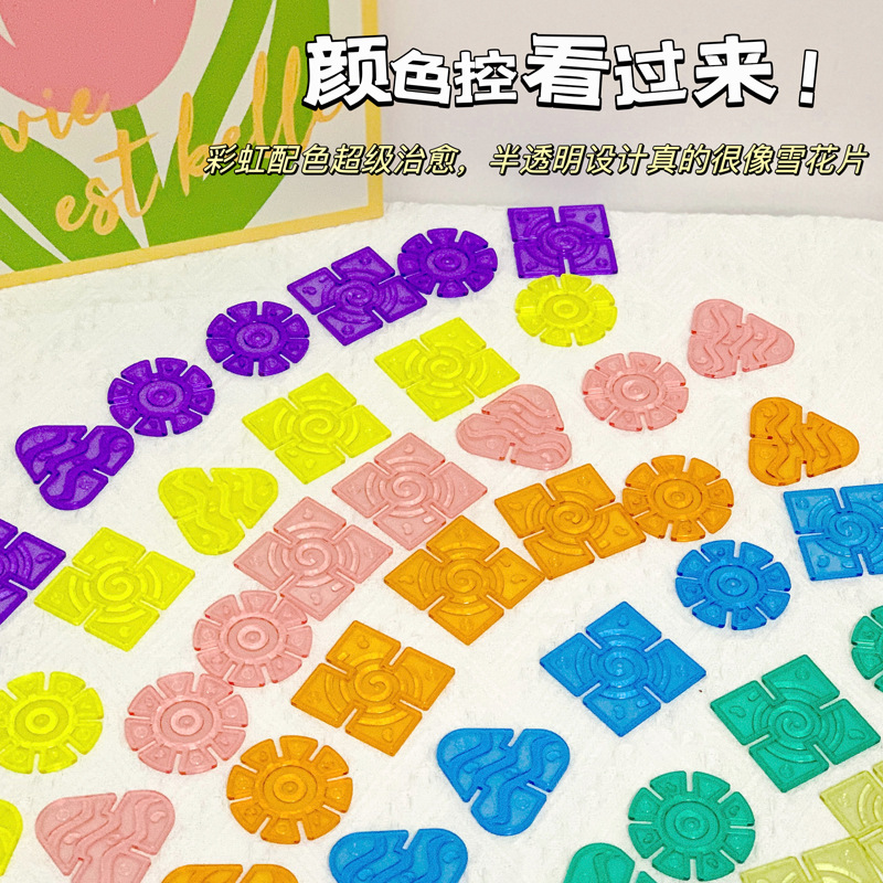 Translucent geometric snowflake building blocks, children's stained glass crystal multi-colored puzzle, educational and versatile, perfect for babies' imagination.