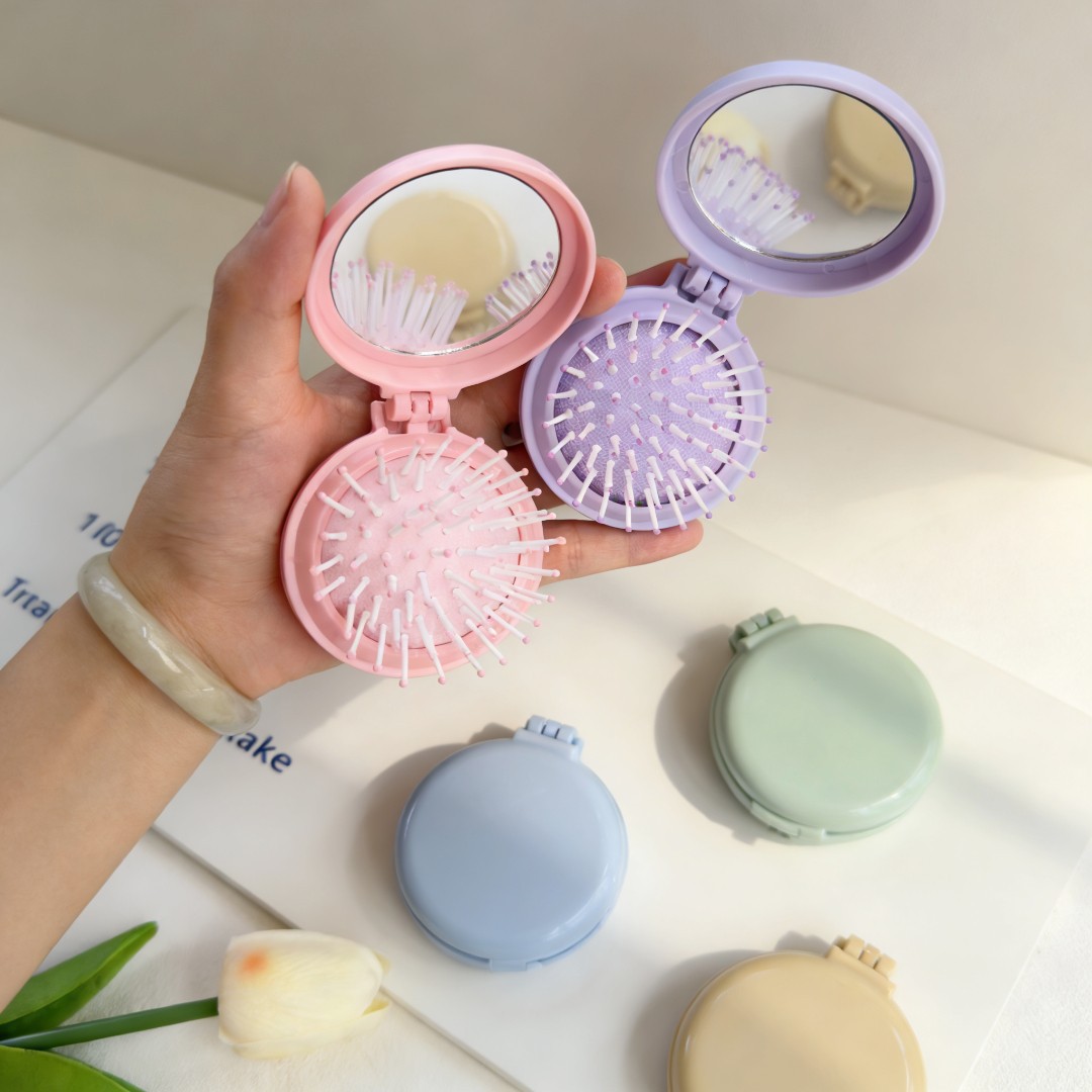 Cute candy-colored air cushion comb, mini comb, portable folding mirror comb, airbag comb, home ladies' massage comb