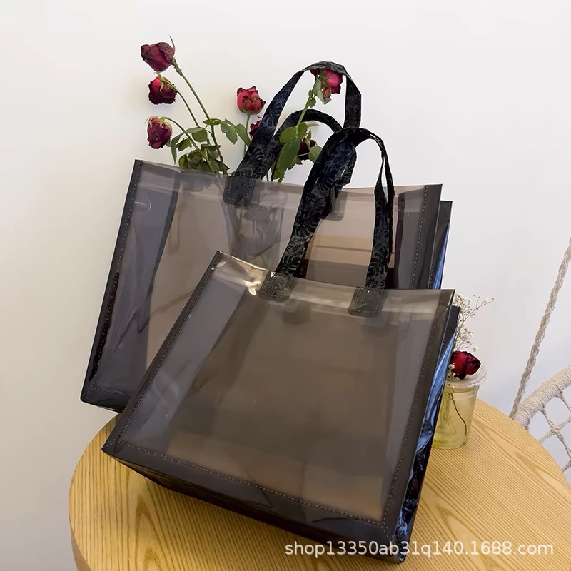 Transparent bags, shoulder carry, women's clothing store tote bags, high-end gift packaging bags, plastic shopping bags wholesale.