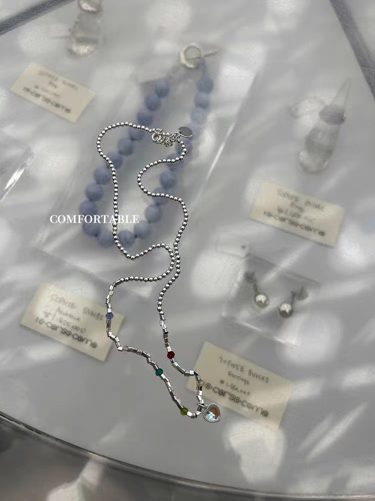 WXLSTUDIO's same style Moonstone necklace - exquisite with small round beads and rainbow-colored heart shapes.