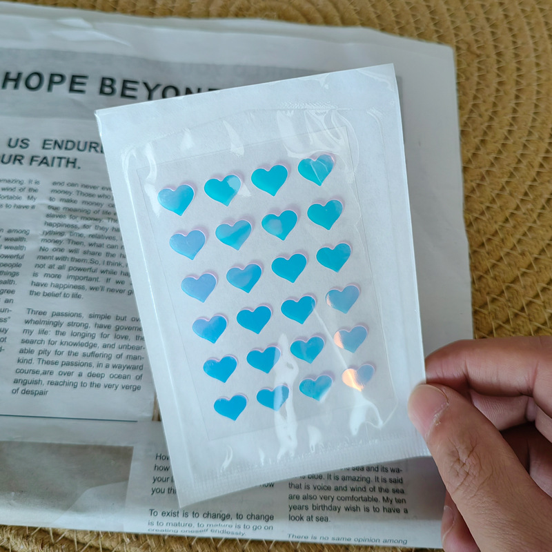 Laser-cut color-changing heart-shaped acne isolation dressing, 24-piece hydrocolloid invisible concealer patch, factory direct wholesale.