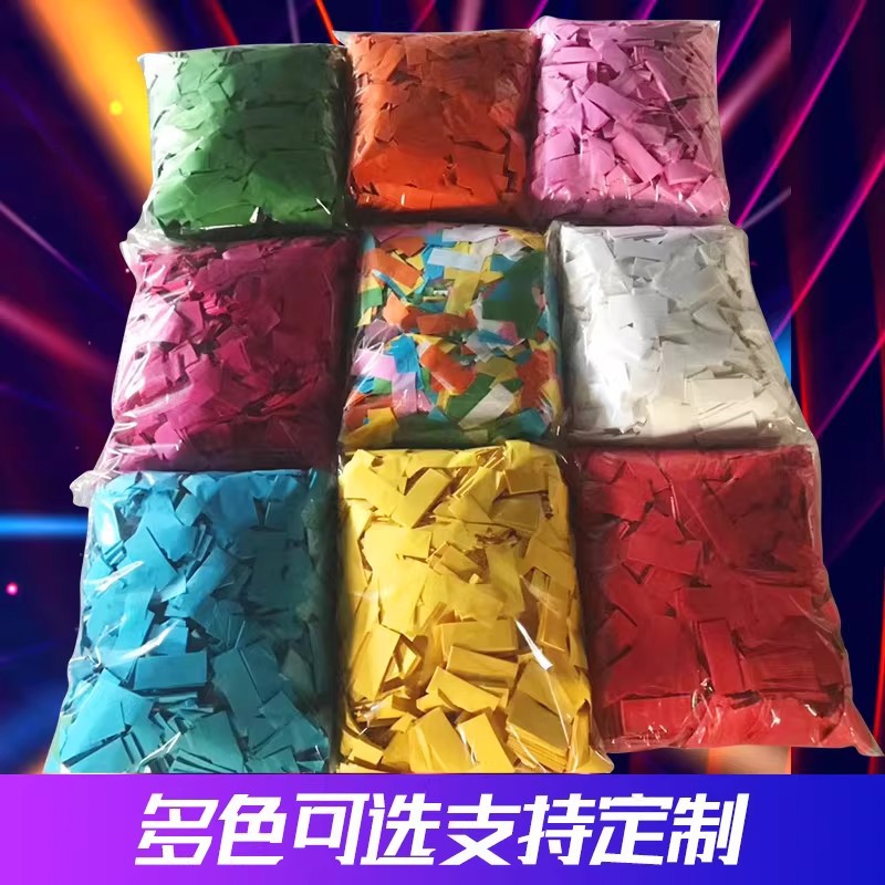Blizzard-themed hand-thrown paper, flame-retardant paper scraps, bar atmosphere, nightclub bar fireworks, rainbow machine shredded paper.