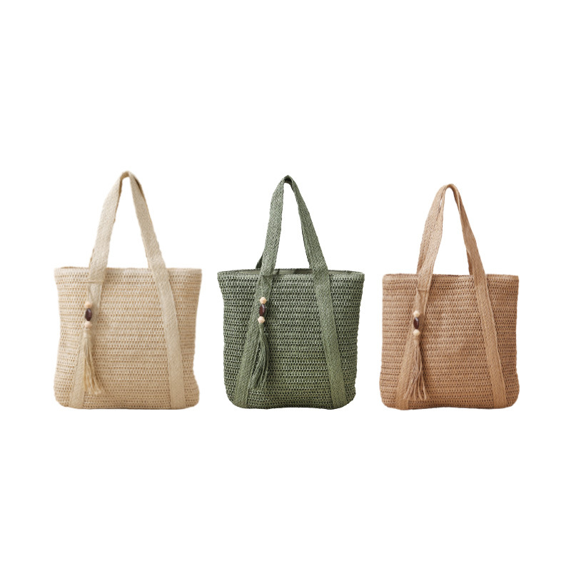 Stylish single-shoulder paper rope straw bag, large capacity, commuter handmade woven bag, casual vacation style beach bag for women.