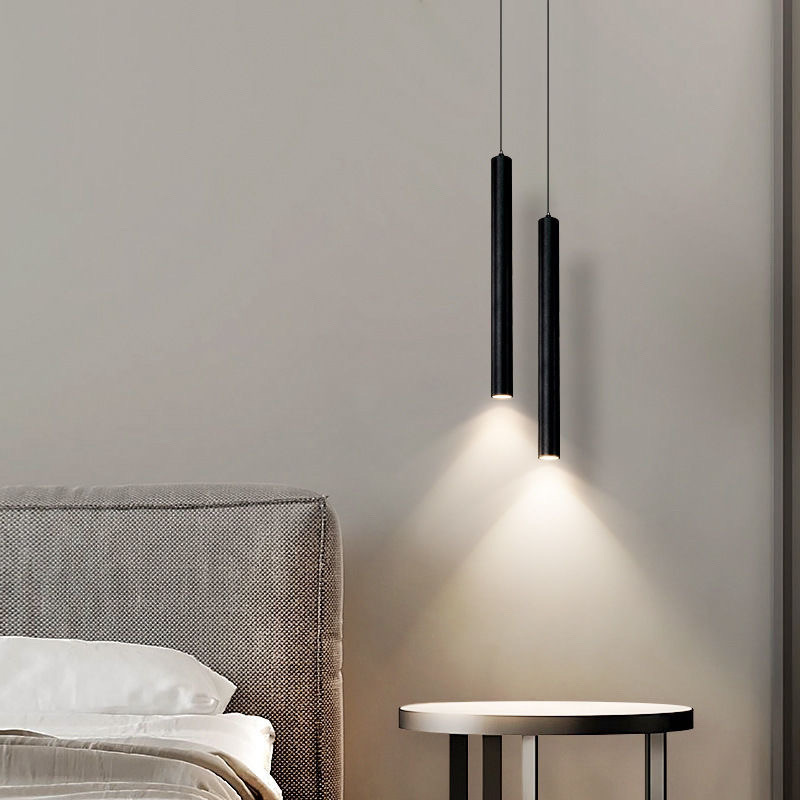 The new pendant lamp for the bedroom features a modern and simple long bar counter pendant lamp, a light luxury and creative minimalist Nordic style master bed headlamp