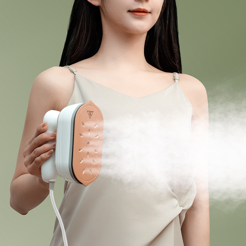 Portable home steam iron, handheld steam garment steamer, rotating clothes ironing device.