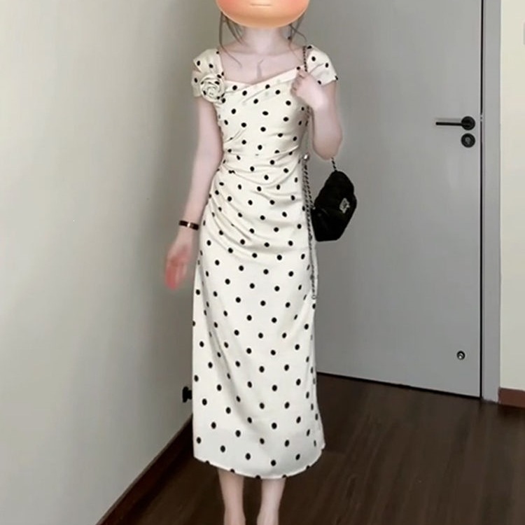 French-style white polka dot dress, women's summer 2026 new style, three-dimensional floral waist-cinching hip-hugging long skirt.