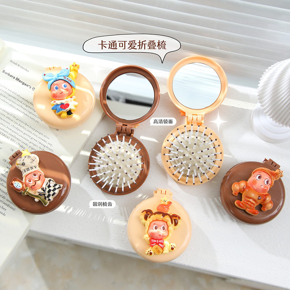 Cute star person folding comb, girls' hair cushion comb, students' hair comb, cartoon comb, mirror integrated wholesale