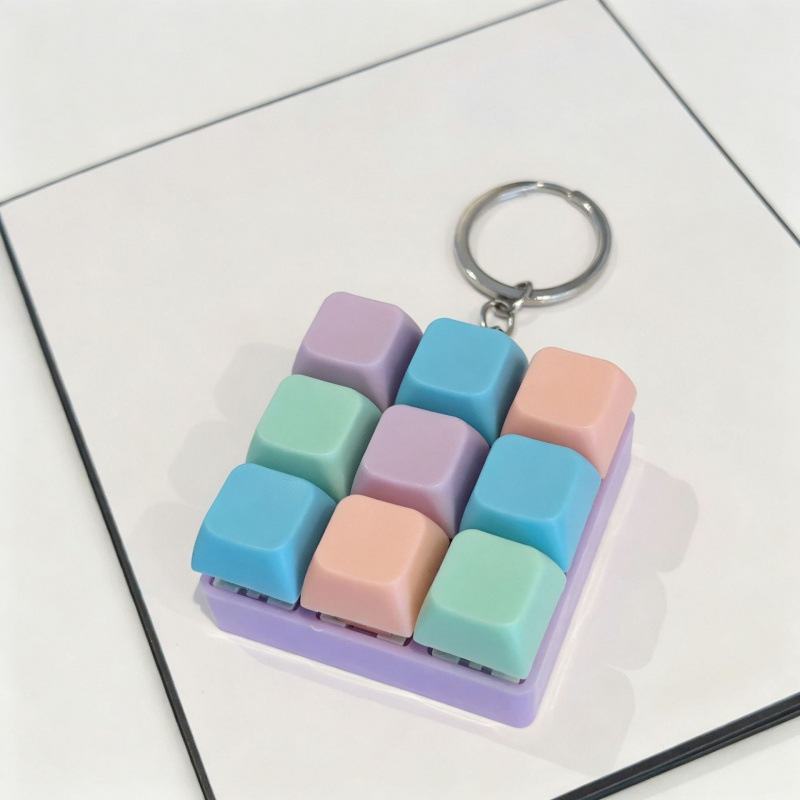 Cross-border mechanical key 9-key multi-color mixed-color keychain, stress-relieving key toy, creative keyboard pendant factory wholesale