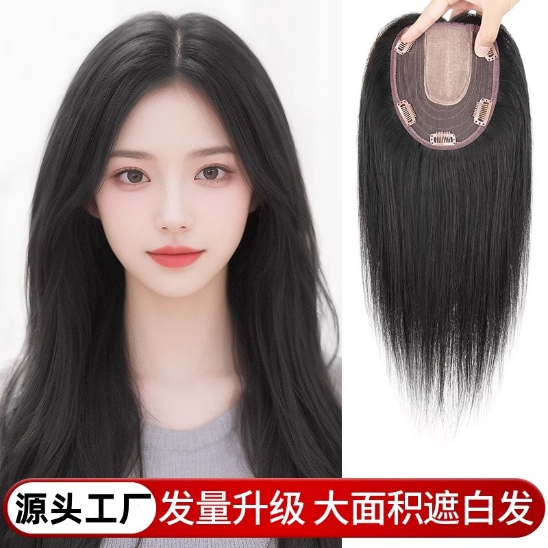 Women's hair extensions with natural, seamless, invisible long hair to add volume and cover large areas of gray hair.