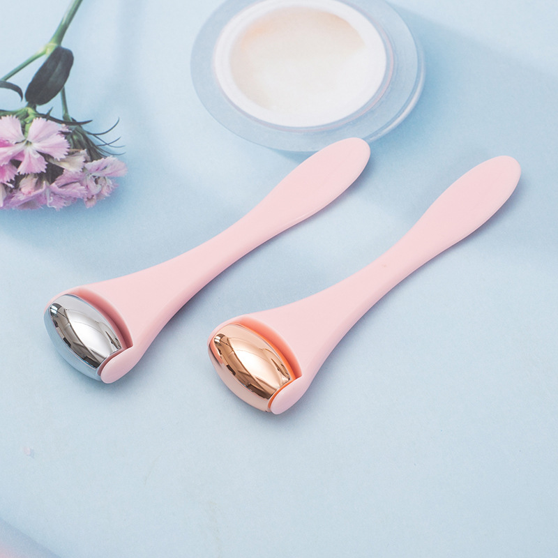 Cross-border best-selling facial silicone massage stick with zinc alloy roller, eye cream stick, pink multi-color beauty massager set