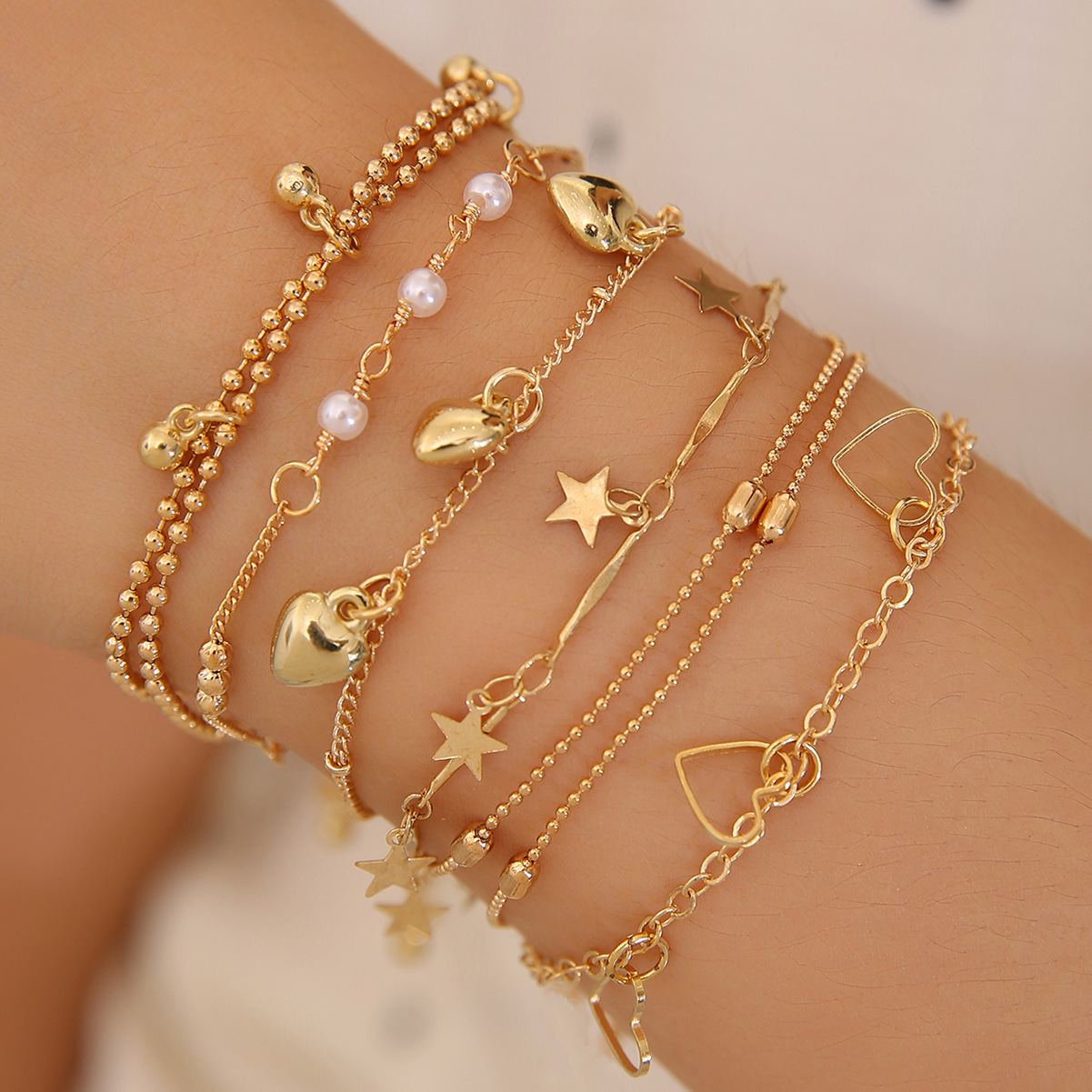 Cross-border e-commerce, Europe and America, best-selling 8-piece women's bracelet set with butterfly and heart design, fashionable and versatile jewelry wholesale.
