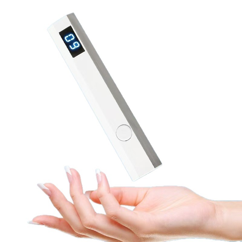 Third-generation rechargeable LCD nail lamp with display screen, two timer settings, portable handheld model.