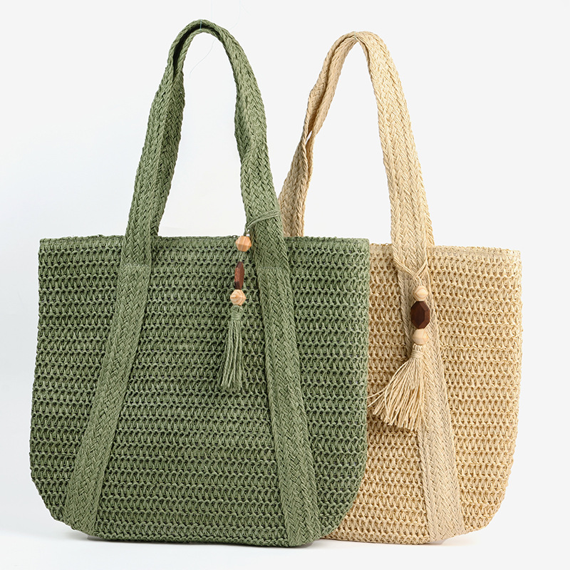 New machine-woven solid color woven bag, casual single shoulder straw bag, wooden bead tassel, resort style beach bag, versatile women's bag