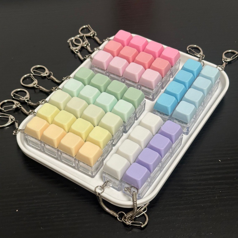 Macaron four-key decompression toy keychain, cross-border no-light blue switch, color one-line keyboard decompression test switch