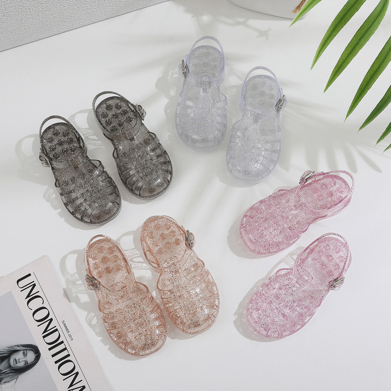 Summer children's sandals, outdoor wear, plastic flat-soled hollow sandals, versatile, jelly buckle transparent bird's nest girls' sandals