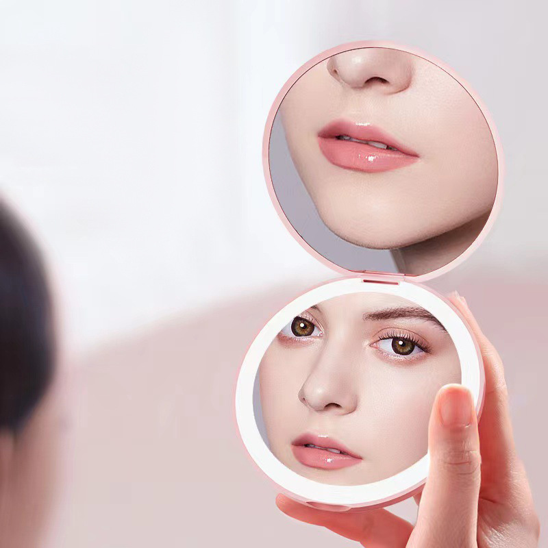 Amazon's new minimalist mini pocket portable folding round mirror with 3x magnification and LED lighting.