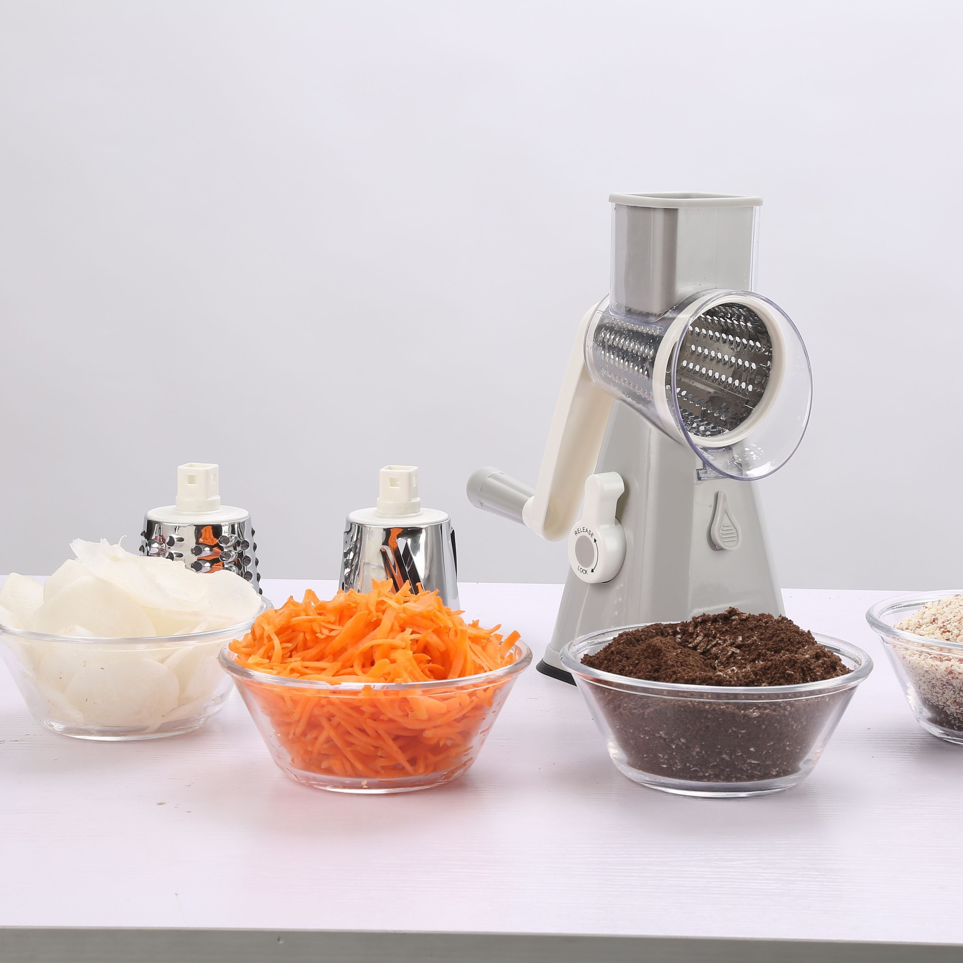 Best-selling multi-functional vegetable cutter, hand-cranked roller, slicer, shredder, grinder, shredder and slicer for the kitchen