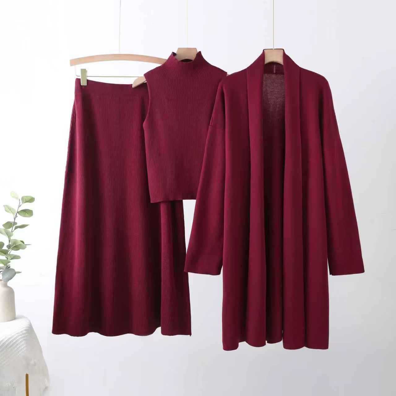 Cross-border autumn new laid-back and loose knitted set for women, long shawl cardigan, high-neck sweater and skirt three-piece set