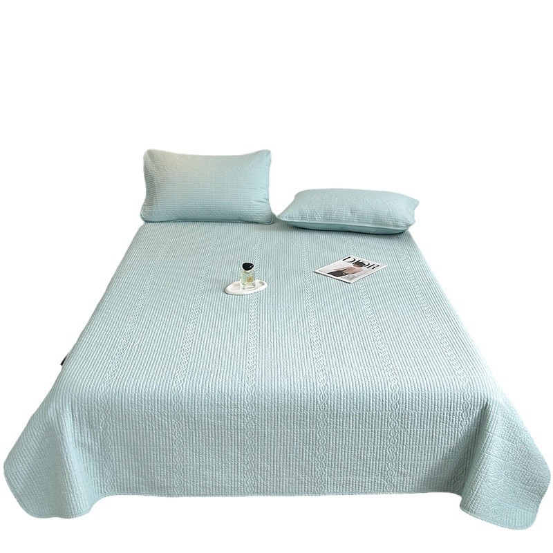 Colorful candy-colored, high-temperature enzyme-washed, double-sided pure cotton quilted bed sheet with cotton filling, suitable for all seasons.