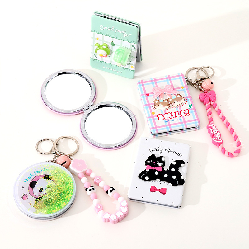 Unique and creative double-sided flip-up folding mirror for women, perfect for outdoor use, handheld, portable makeup mirror, small round mirror.