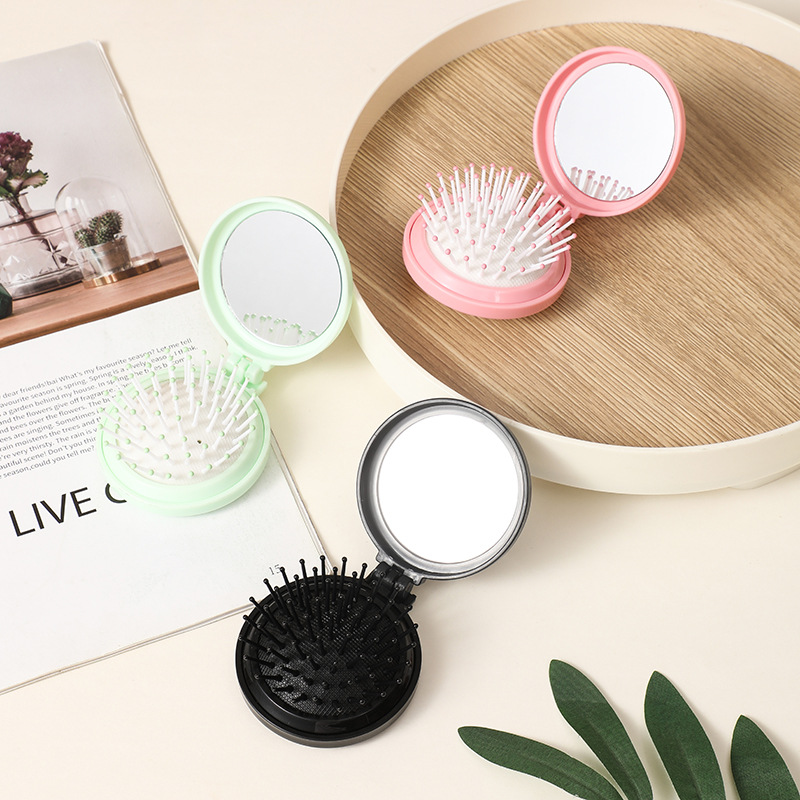 Folding cute mini portable round airbag mirror comb, one-piece comb with mirror flip cover, ins style factory wholesale