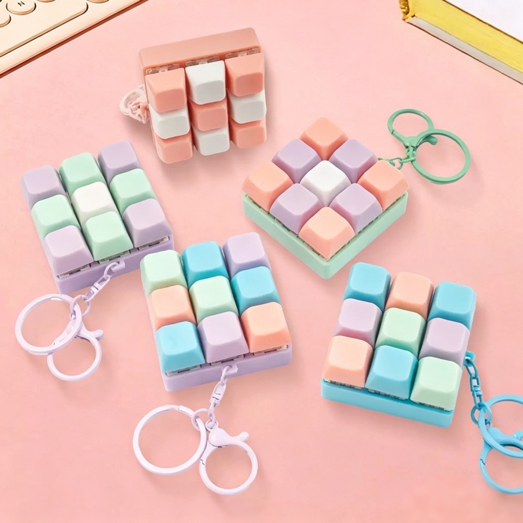 Cross-border bestseller nine-key Tetris pendant keychain macaron-colored stress-relieving key toy pendant source