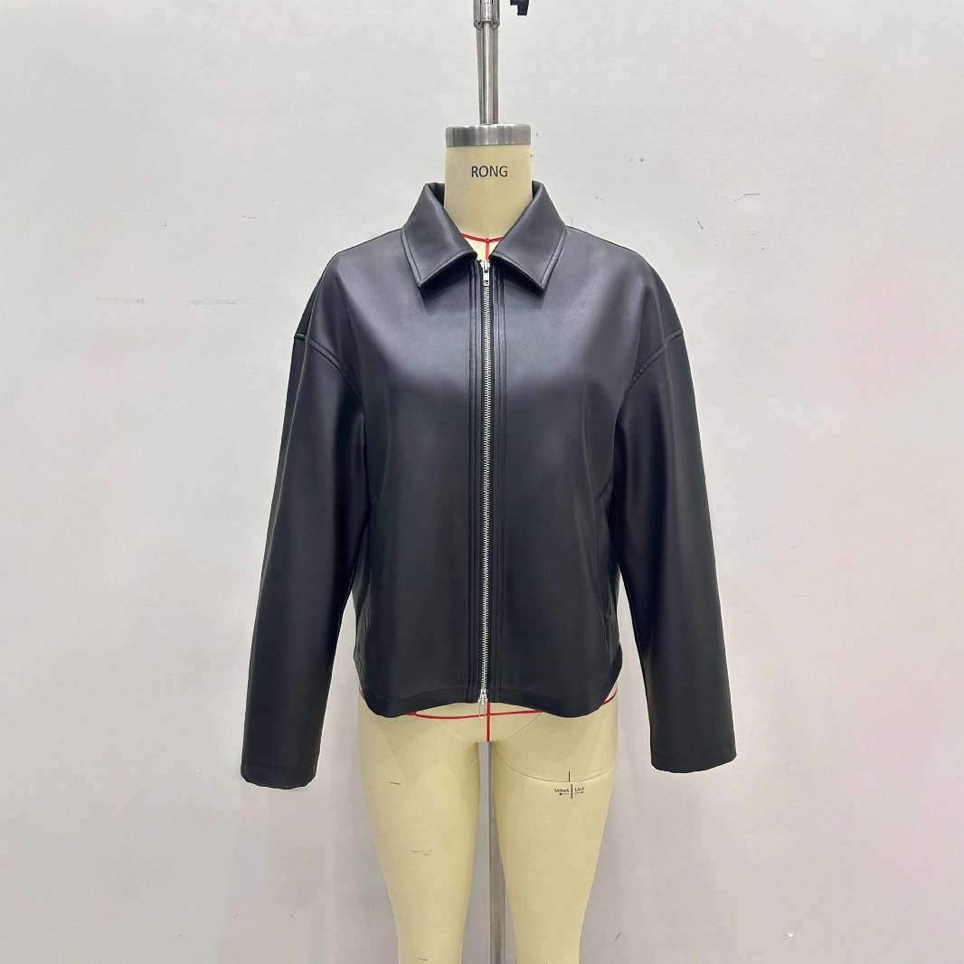 A new minimalist black leather short jacket with a lapel design for commuting urban leather jackets in the autumn and winter of Europe and America