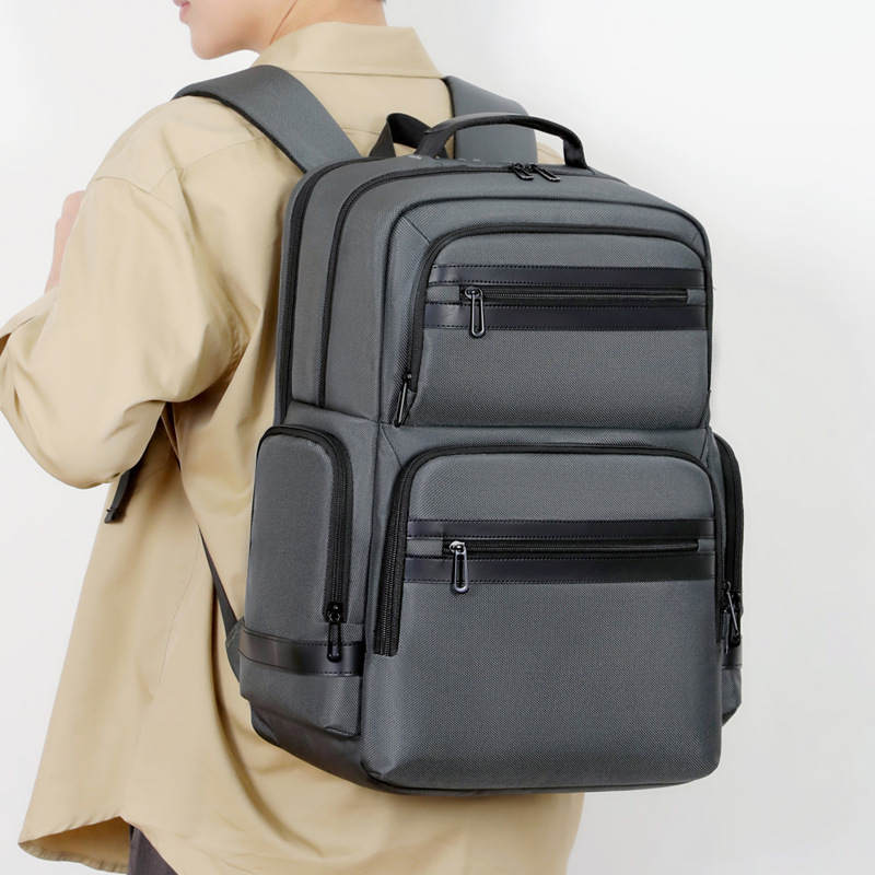 Men's backpack, business style, large capacity, waterproof, fashionable and versatile, suitable for commuting, business trips and travel.