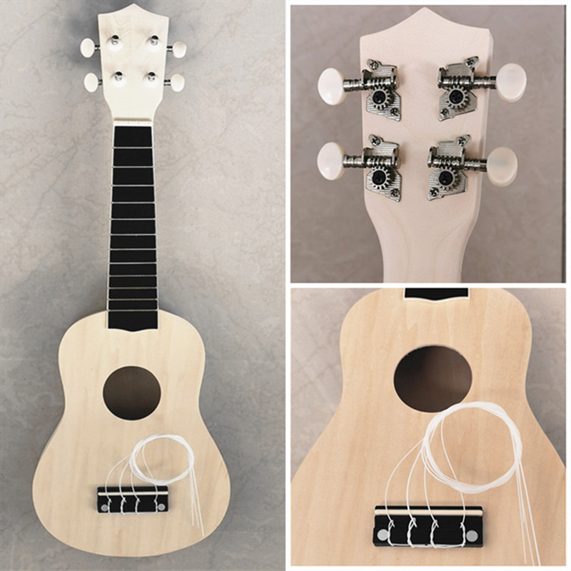 Factory direct sales of 21-inch wooden ukulele blanks, unpainted, DIY-paintable, no-assembly semi-finished products.