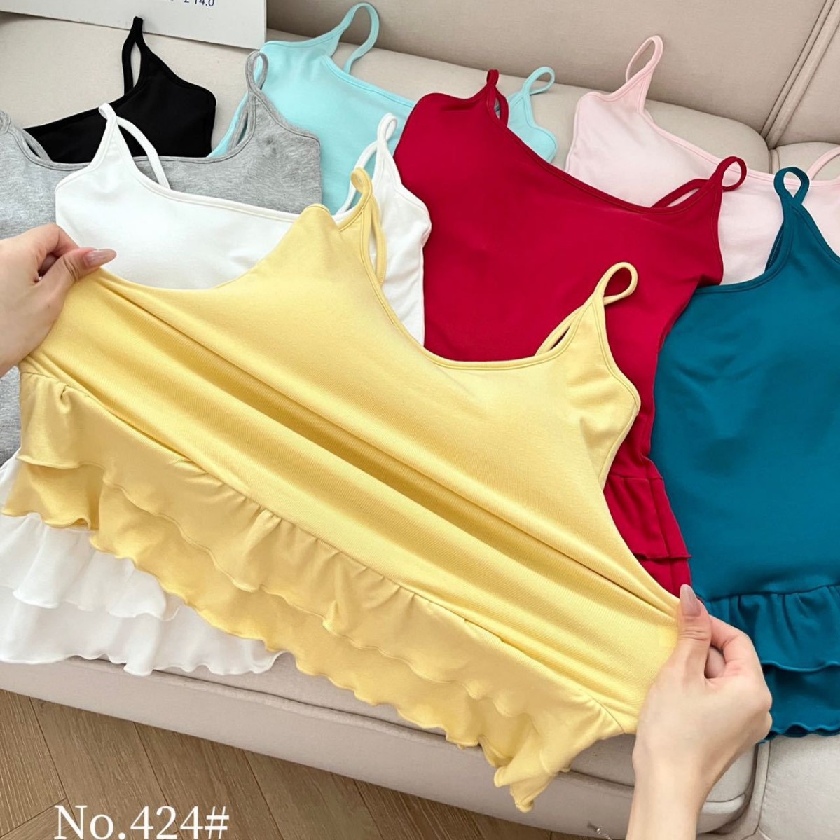 This is a new summer style for women, featuring a black ear-trimmed hem, a cross-shaped backless halter top, and a top layer with a chest pad