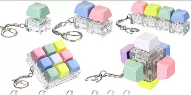 Cross-border key decompression toy Solid color four-key macaron one-line keyboard keychain small pendant decompression key